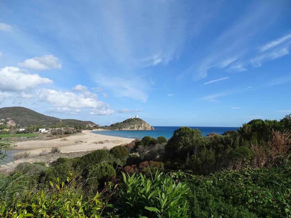 Case Sul Mare Residenze Di Bes Chia Exterior foto